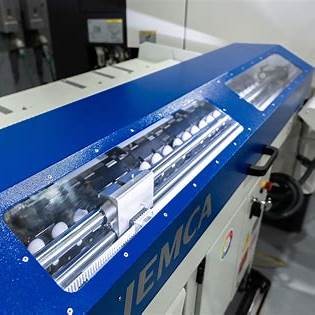 Bộ cấp phôi tự động gắn với máy tiện